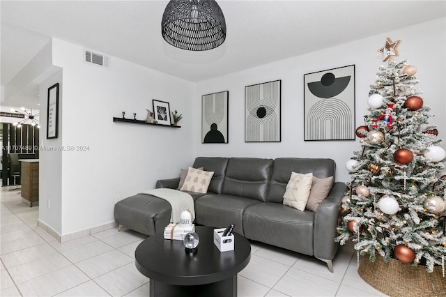 living room with light tile patterned flooring