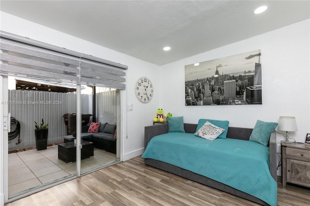 bedroom with a closet and wood-type flooring