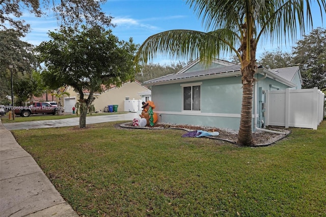 view of home's exterior with a lawn