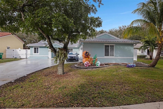 view of front of home with a front yard