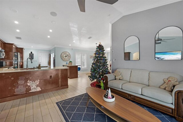 12921 SW 17th Ct, Miramar, FL 33027 - living area featuring a ceiling fan, crown molding, light wood finished floors, and recessed lighting