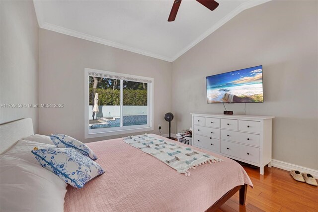 12921 SW 17th Ct, Miramar, FL 33027 - bedroom with vaulted ceiling, ornamental molding, wood finished floors, baseboards, and ceiling fan