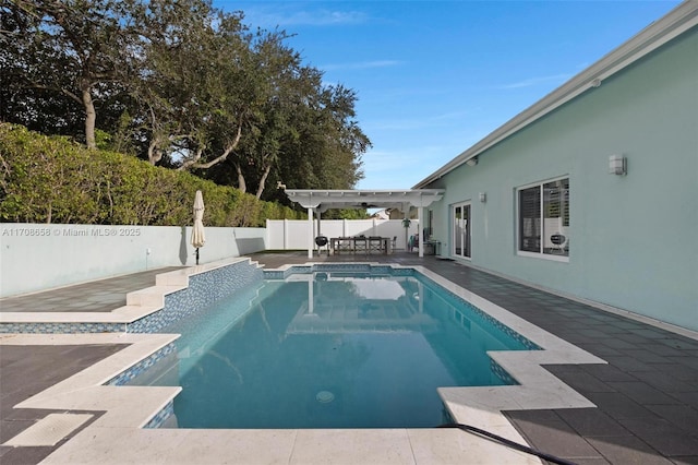 12921 SW 17th Ct, Miramar, FL 33027 - view of swimming pool with a pergola, a fenced backyard, and a patio area