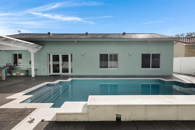 view of swimming pool featuring a pergola and a patio area