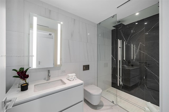 bathroom with vanity, an enclosed shower, tile walls, and toilet