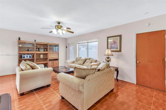 tiled living room featuring ceiling fan