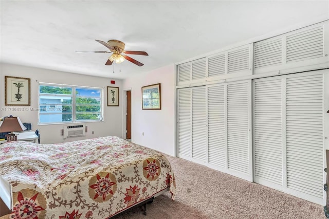 carpeted bedroom with a wall mounted AC and ceiling fan