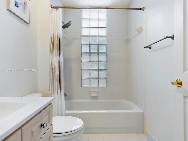 full bathroom featuring tile patterned floors, vanity, shower / tub combo, and toilet