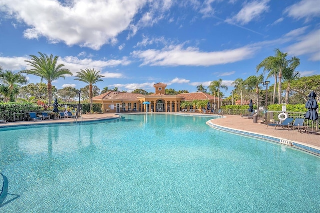 view of swimming pool with a patio area