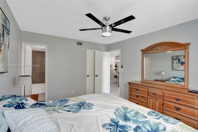 bedroom with tile patterned floors and ceiling fan