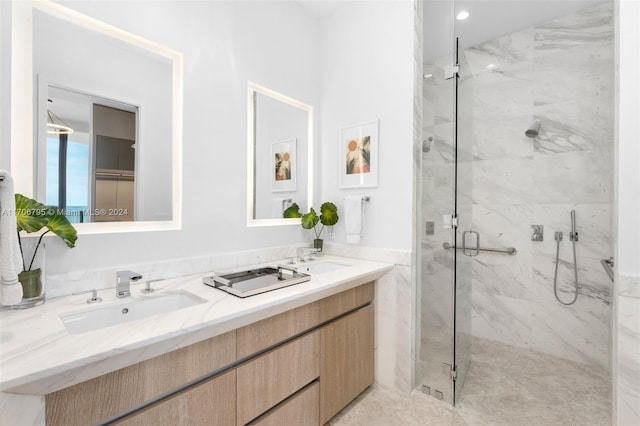 bathroom with vanity and an enclosed shower