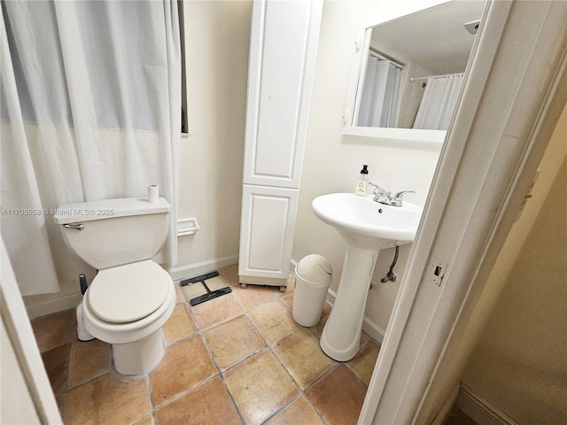 bathroom featuring toilet