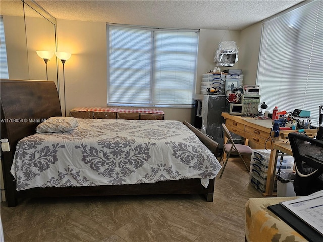 bedroom with a textured ceiling