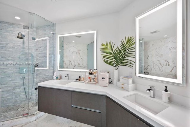 bathroom featuring vanity, an enclosed shower, and tile walls