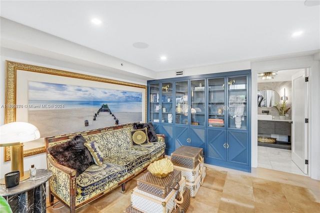 sitting room with light tile patterned floors