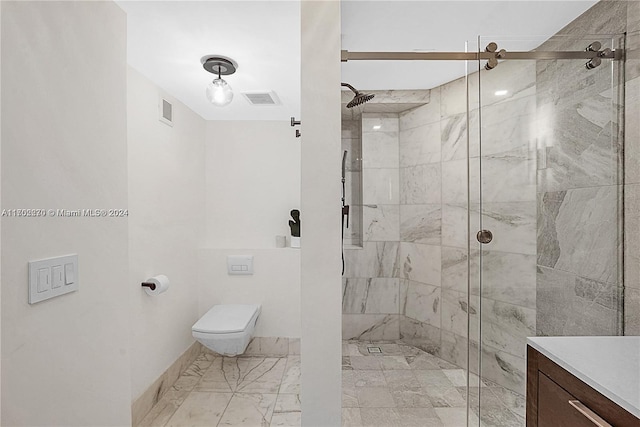 bathroom with vanity, a shower with shower door, and toilet