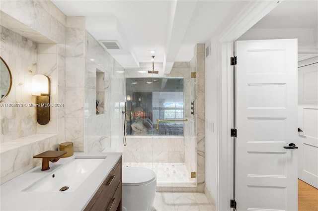 bathroom featuring hardwood / wood-style floors, vanity, a shower with shower door, and toilet