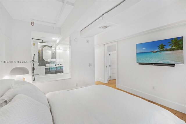 bedroom featuring light hardwood / wood-style floors