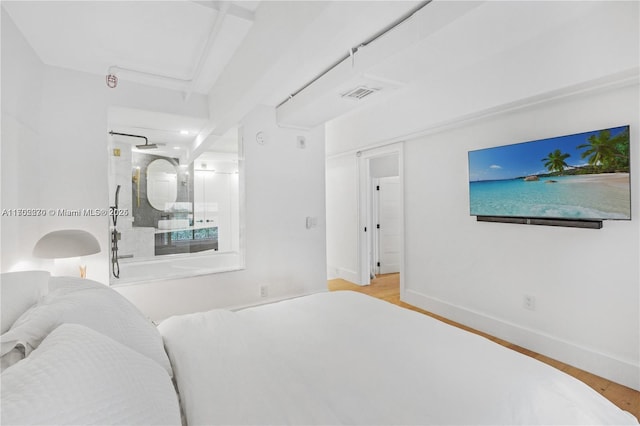 101 N Clematis St Unit 308, West Palm Beach, FL 33401 - bedroom featuring wood finished floors and baseboards