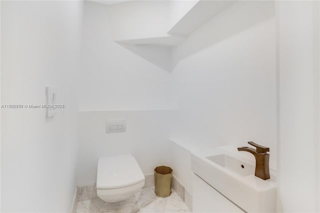 101 N Clematis St Unit 308, West Palm Beach, FL 33401 - bathroom with marble finish flooring and vanity