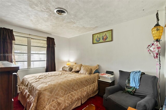 bedroom with a textured ceiling