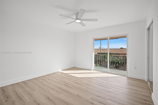 unfurnished room featuring light hardwood / wood-style flooring and ceiling fan