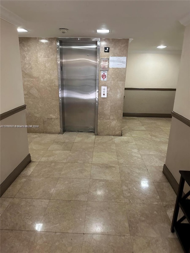 corridor featuring elevator