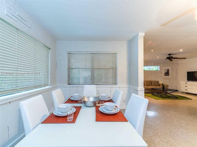 dining area with ceiling fan