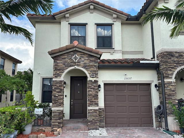 view of front of home with a garage