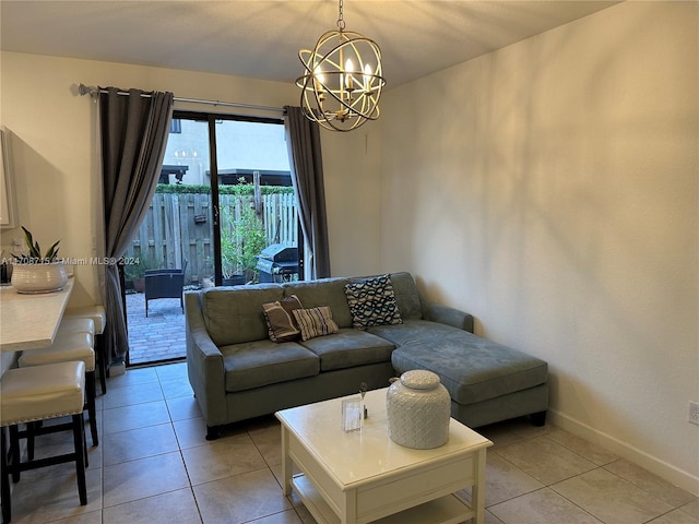 living room featuring light tile patterned flooring and an inviting chandelier