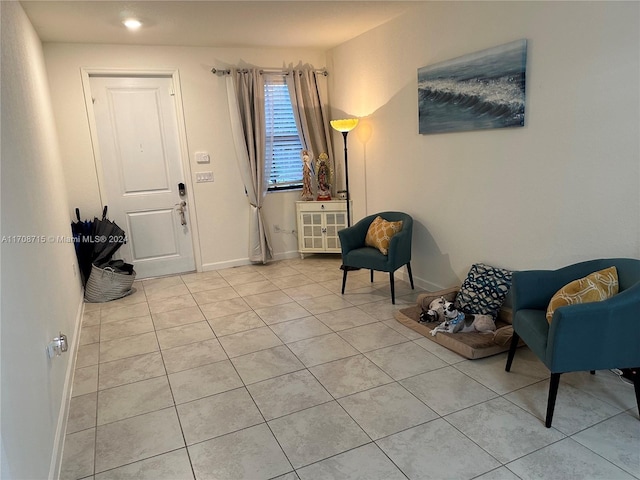 foyer entrance featuring light tile patterned floors