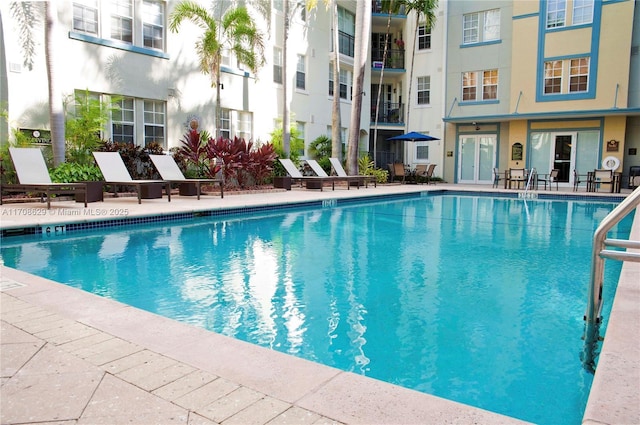 view of pool with a patio area