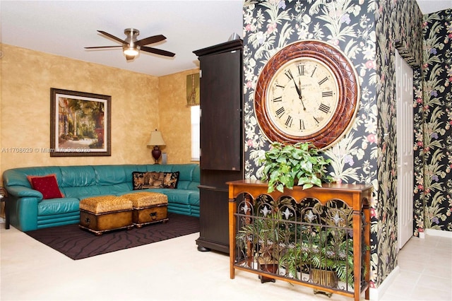 living room featuring ceiling fan and tile patterned floors