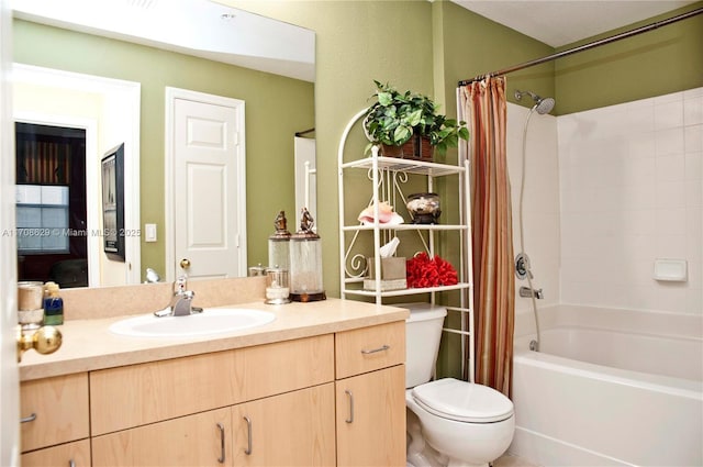 full bathroom with shower / tub combo with curtain, vanity, and toilet