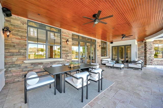 view of patio featuring ceiling fan and an outdoor hangout area