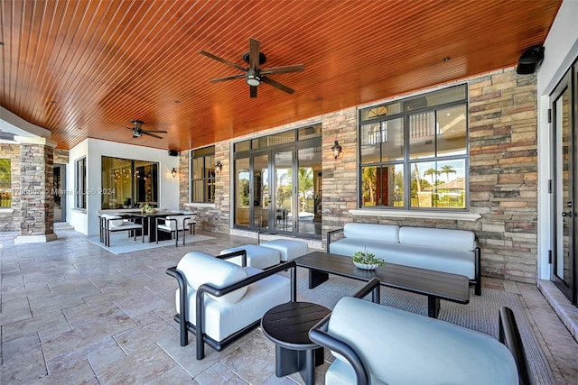 view of patio with an outdoor hangout area and ceiling fan