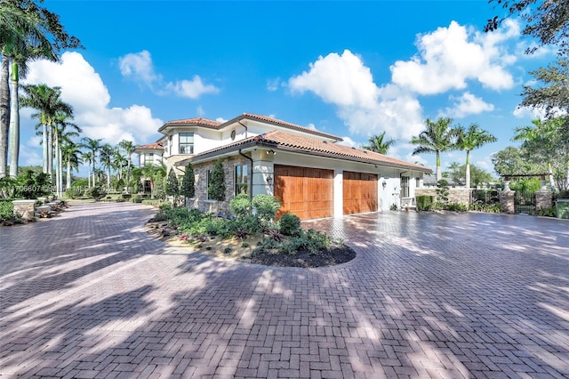 view of front of property featuring a garage