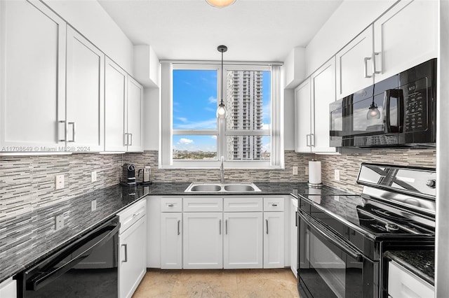 kitchen featuring white cabinetry, sink, backsplash, decorative light fixtures, and black appliances