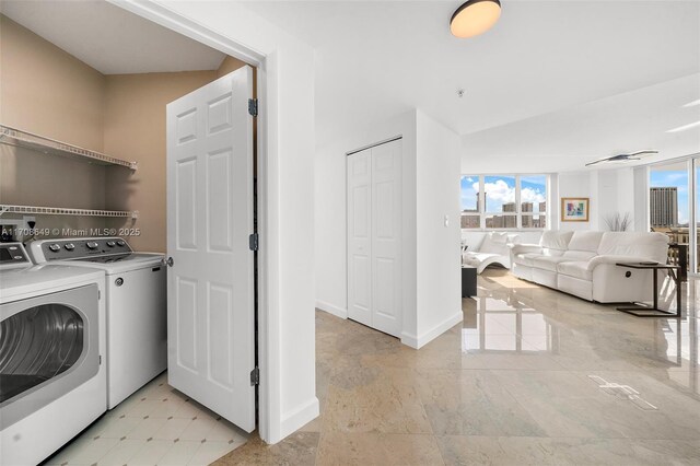 laundry room with plenty of natural light and separate washer and dryer