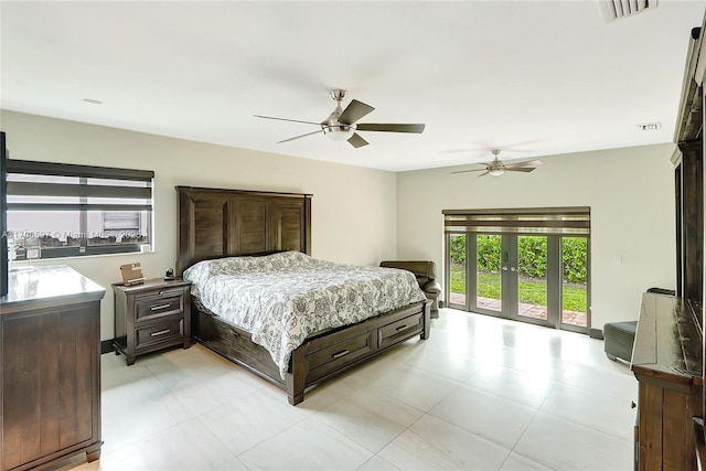 bedroom with french doors, ceiling fan, and access to exterior