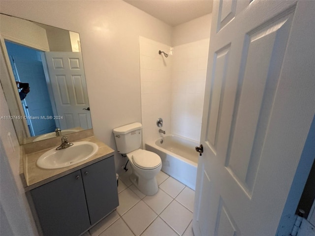 full bathroom featuring tile patterned floors, vanity, toilet, and bathing tub / shower combination