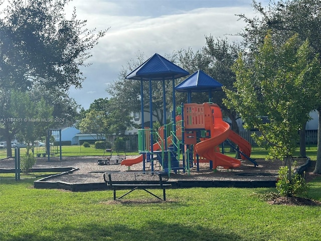 view of playground featuring a lawn