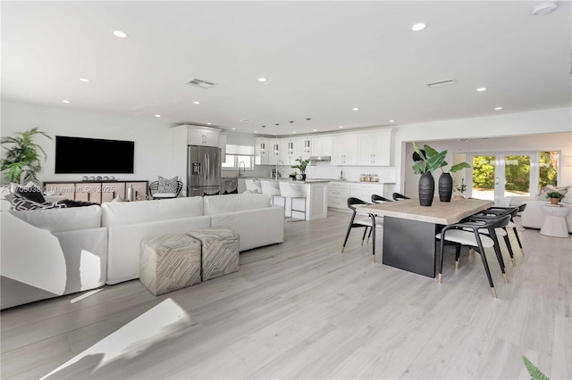 living room featuring light hardwood / wood-style floors