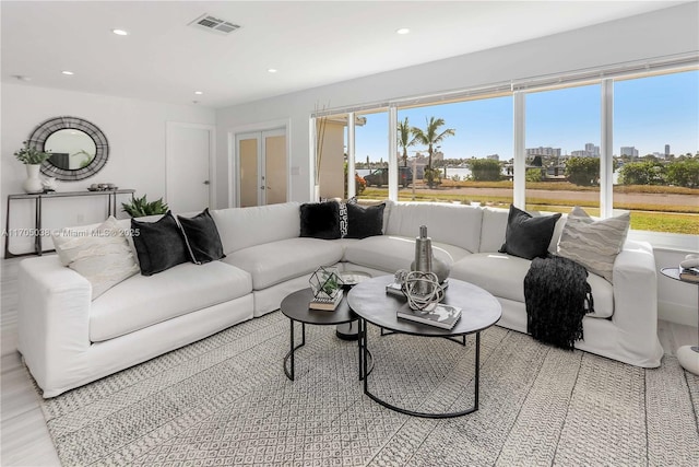 living room with light hardwood / wood-style flooring