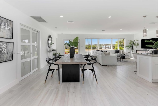 dining area featuring light hardwood / wood-style flooring