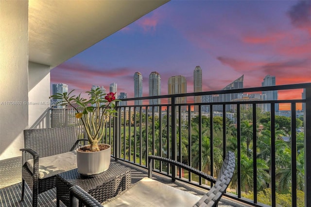 view of balcony at dusk