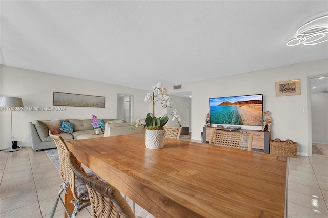 dining room featuring light tile patterned flooring