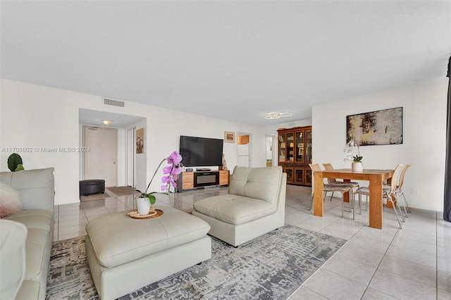 living room featuring light tile patterned flooring