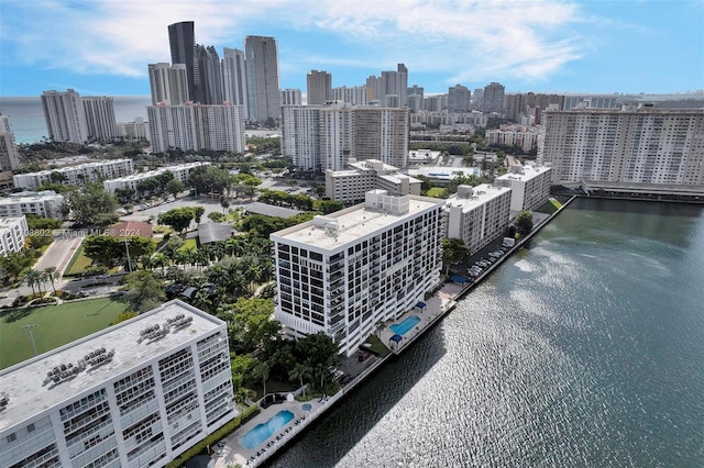 property's view of city with a water view