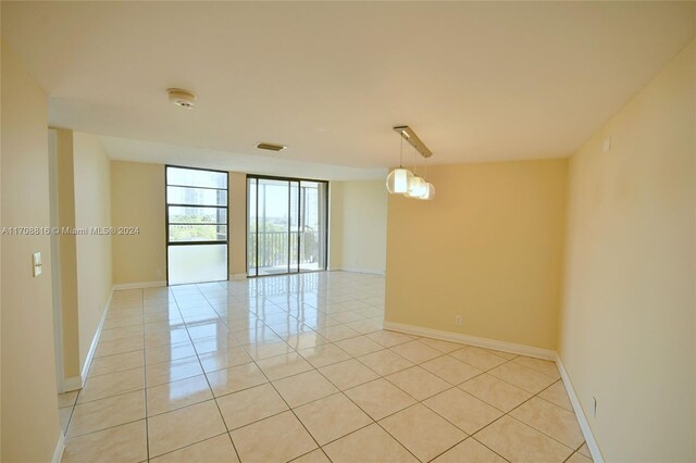 view of tiled spare room